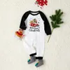 Basset Hound Matching Christmas Pajamas With Dog