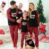 Gingerbread Cookie Pajamas With Santa Hat Black And Red - variant image 1