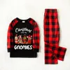 Cute Gnomies Matching Christmas Pajamas With Dog